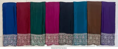 Wholesale Ajrak Printed Crepe Sarees: Single saree with diamond-patterned Ajrak print in black, red, and blue.