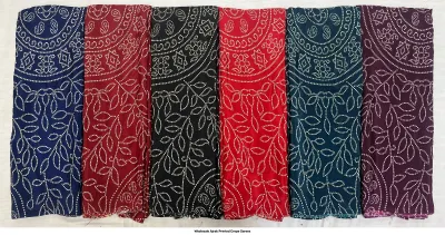 Wholesale Ajrak Printed Crepe Sarees: Six folded sarees with white leaf and circular Ajrak block print patterns.