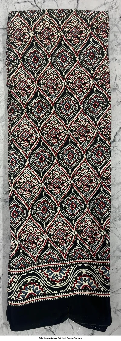 Wholesale Ajrak Printed Crepe Sarees: Single saree in black with a traditional white geometric Ajrak print.