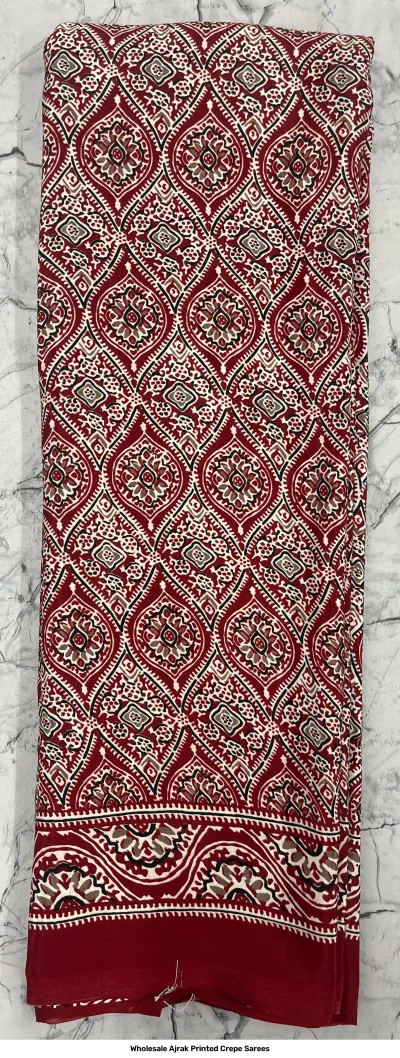 Wholesale Ajrak Printed Crepe Sarees: Catalog layout showing a cream saree with colorful geometric patterns and fabric swatches.