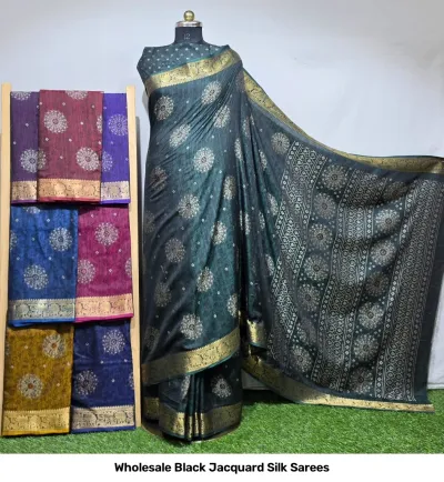Wholesale Black Jacquard Silk Sarees: Dark grey patterned saree with gold zari border, displayed on mannequin with assorted color variations on rack.