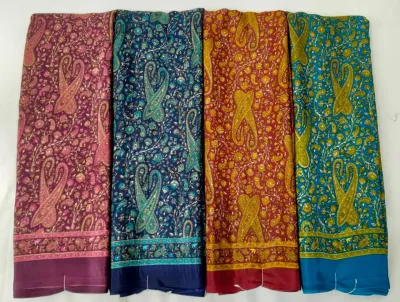 Wholesale Crepe Silk saree, multi-colored paisley floral print on purple, navy, red, and blue base, includes border.