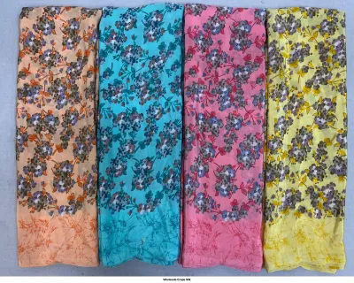 Wholesale Crepe Silk saree, floral print on peach, turquoise, pink, and yellow base.