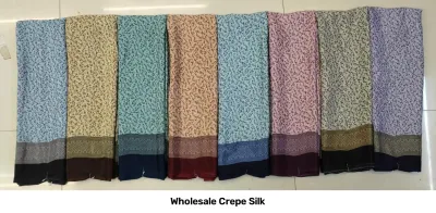 Wholesale Crepe Silk saree, light blue, cream, and pink bases with delicate small floral print.