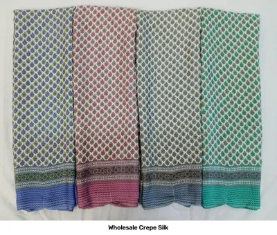Wholesale Crepe Silk saree, white base with small leaf motif print and contrasting colored borders.