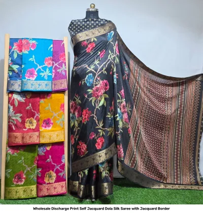 Wholesale Discharge Print Self Jacquard Dola Silk Saree with Jacquard Border: Black saree, floral discharge print, self-jacquard pattern, gold zari-work border.