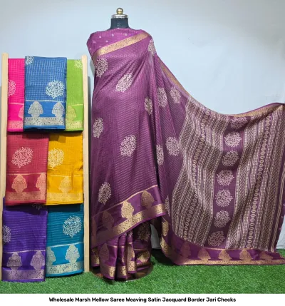 Wholesale Marsh Mellow Saree Weaving Satin Jacquard Border Jari Checks purple satin saree with tree motifs and zari border with folded sarees on rack.