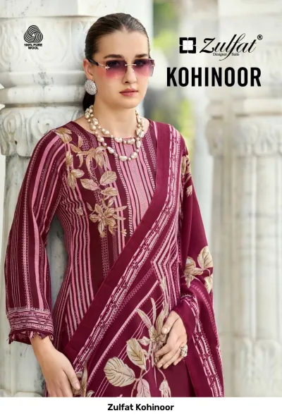 Zulfat Kohinoor: Model wearing a wine-colored printed salwar suit with beige floral motifs and vertical stripes.
